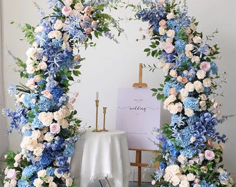 Wedding Floral Arrangement in Blue, Pink, and Champagne for Horn Arch