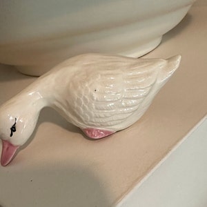 Vintage white iridescent duck pink trim
