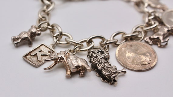 Vintage 12 charm Horse, Elephant, Marlin, Coin, T… - image 2