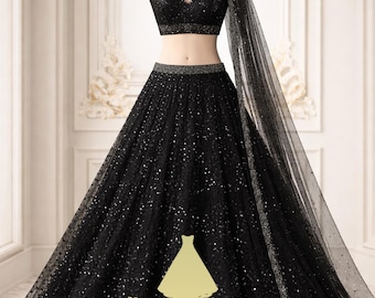 May include: A black formal gown with a matching top and skirt, displayed on a mannequin. The outfit features a V-neck top and a full skirt, both embellished with sparkling details. A sheer, matching scarf drapes over the shoulder. The text "Dreamvilla4u DESIGNER OUTFITS" is visible.