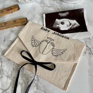 Miscarriage baby loss ultrasound scan keepsake personalised fabric envelope pouch memorial gift for memory box with angel wings baby feet.