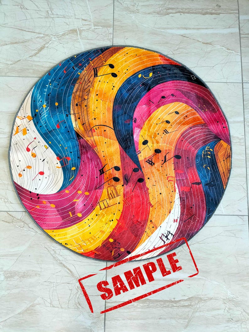 May include: Round rug with a colorful abstract design featuring musical notes and swirls of blue, yellow, pink, and red. The rug has a gray border and the word "SAMPLE" is stamped in red on the bottom right corner.