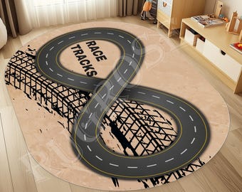 May include: A beige round rug with a black and white infinity symbol design. The symbol is a race track with the words "Race Tracks" written inside the top loop.