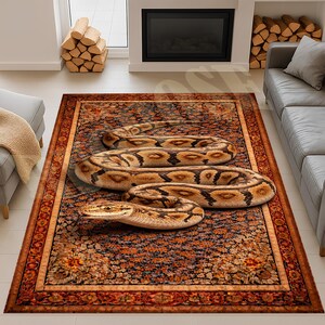 May include: A rectangular rug with a detailed floral pattern in shades of brown, red, and orange. A large, realistic snake with brown and tan markings is coiled on the rug, creating a striking visual contrast.