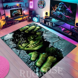 May include: A green Hulk rug with a 3D effect, showing Hulk breaking through a concrete wall. The rug is on a wooden floor in a game room.