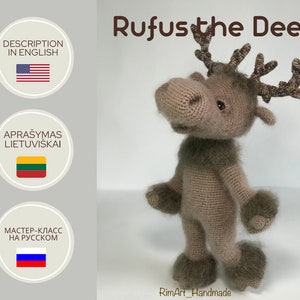 May include: A crocheted deer toy named Rufus, standing on a white background. The deer is brown with a light brown face and has large, brown eyes. The deer has antlers made of brown yarn.