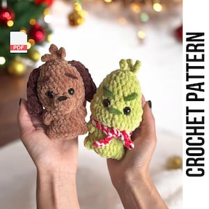 May include: Crochet pattern PDF for making two plush toys: a brown dog and a green Grinch. The Grinch is wearing a red and white striped scarf.