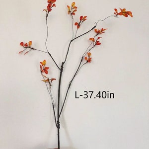 May include: A single artificial branch with brown stems and small orange leaves. The branch is 37.40 inches long.