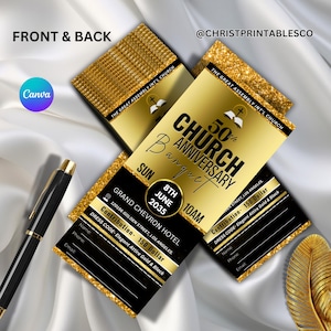 May include: Gold and black church banquet invitation with the text "50th Church Anniversary Banquet". The invitation includes the date, time, and location. A black pen is in the image.