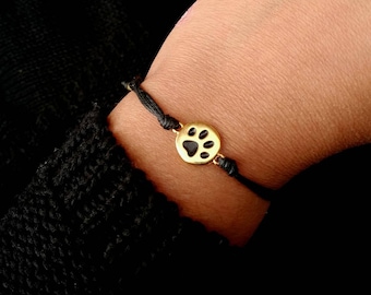 Armband med tassavtryck i guld: Emaljpresent till husdjursälskare