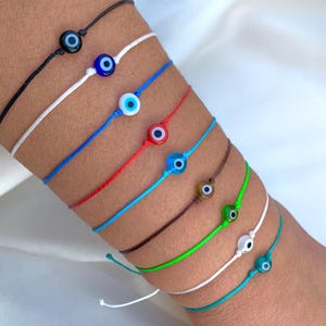 Pulsera minimalista de mal de ojo: cordón ajustable, regalo de joyería protectora para hombres y mujeres.