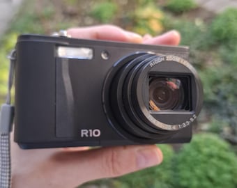 Cámara digital compacta Ricoh R10, 10 MP, zoom óptico de 7,1 x, probada y funciona