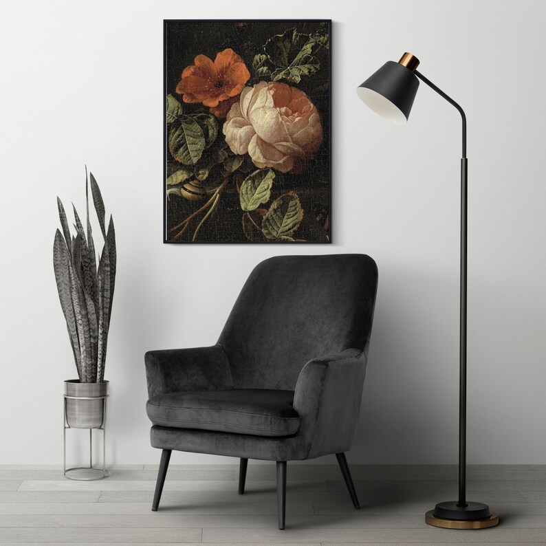 May include: A framed print of a still life featuring a bouquet of pink and orange roses with green leaves against a dark background.