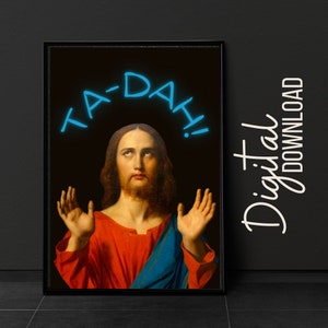 Puede incluir: Impresión artística enmarcada que presenta un retrato de Jesús con la frase "TA-DAH!" en azul neón sobre su cabeza. La imagen tiene un fondo negro y las palabras "Digital Download" están escritas verticalmente a la derecha.