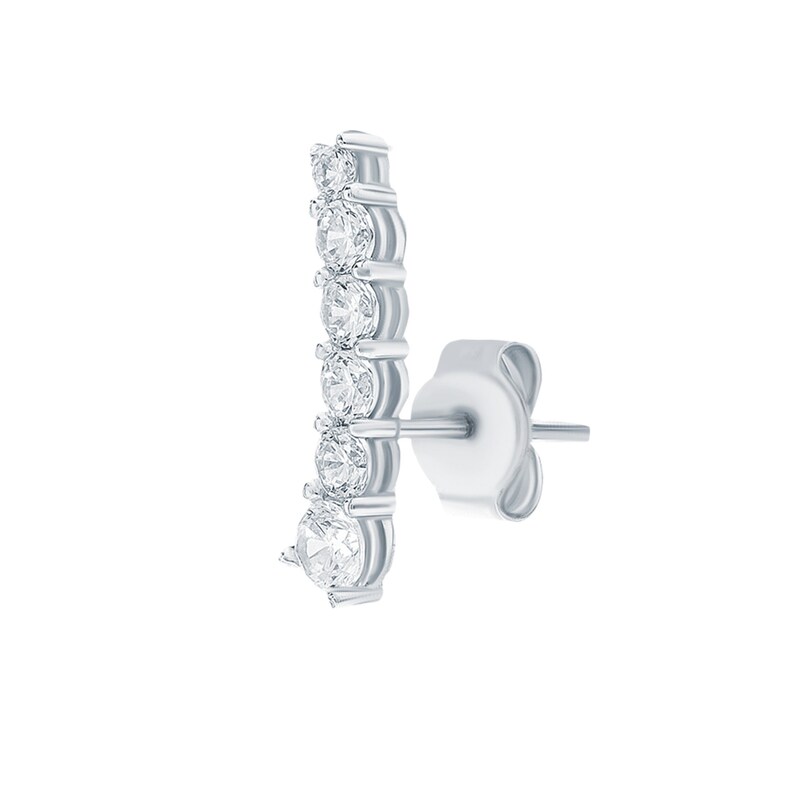 May include: A silver earring with a row of clear round cubic zirconia stones.