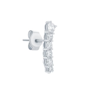 May include: Silver stud earring with a row of clear round cubic zirconia stones.