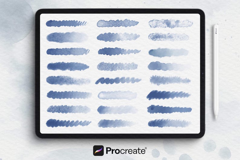 May include: A digital art display on a tablet shows various blue watercolor brushstrokes. The tablet is positioned next to a white stylus. The Procreate logo is visible at the bottom, indicating a digital art tool.