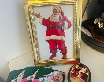 Vintage Coke bundle - framed Santa holding Coke, Coke tin & a trio of vintage Coke coasters