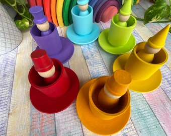 Sorting plates with cups, ball and dolls in hats