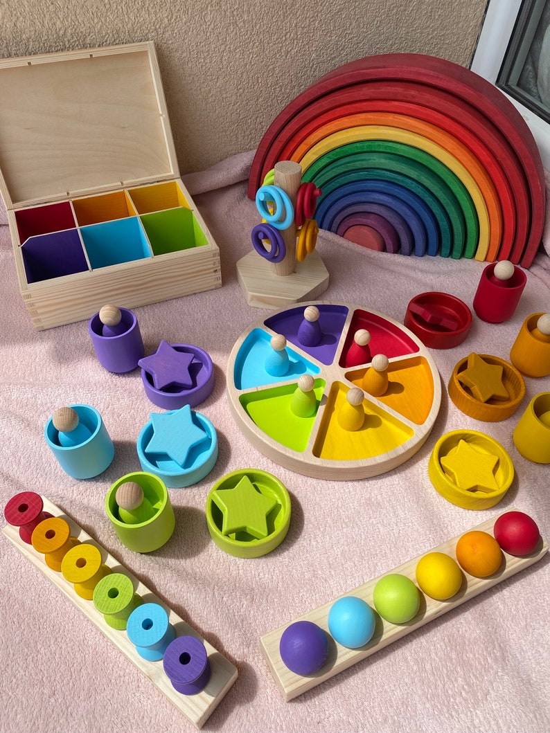 DiDibox, wooden box with doll, bobbins, rings, ball. Montessori play, sorting play image 1