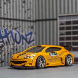 Custom Hot Wheels Renault Megane Trophy: Yellow Diecast Race Car