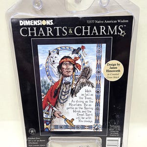May include: A Dimensions Charts & Charms cross-stitch kit, titled "Native American Wisdom." The kit features a detailed image of a Native American man with a wolf and eagle. The finished size is 10" x 14". Includes charms, a multi-color chart, and instructions.