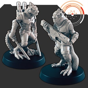May include: Two grey, detailed, plastic figurines of lizard-like creatures wearing futuristic armour. One figurine holds a sword, the other holds a gun. Both figurines are standing on black bases.
