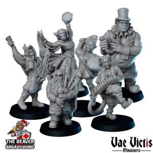 May include: A set of five grey painted miniature figurines of musicians playing various instruments. The musicians include a dwarf playing bagpipes, a human playing a lute, a goblin playing an accordion, a cat-like creature playing a drum, and a large ogre playing a lute. The figurines are all standing on black bases.