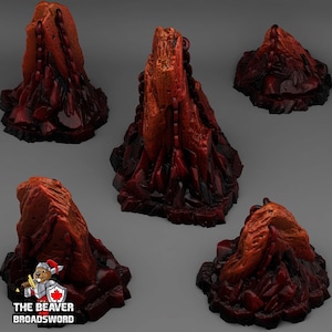 May include: A collection of five red and orange fantasy terrain pieces. The pieces have a rocky, crystalline appearance with a dark red base and lighter orange highlights. The Beaver Broadsword logo is in the bottom left corner.