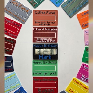 May include: A selection of brightly coloured gift card holders, each with a different purpose, such as "Gas Fund" and "Coffee Fund." Some have slots for cash. Text includes phrases like "Happy Birthday!" and "Treat yo' self." Measurements are not applicable.