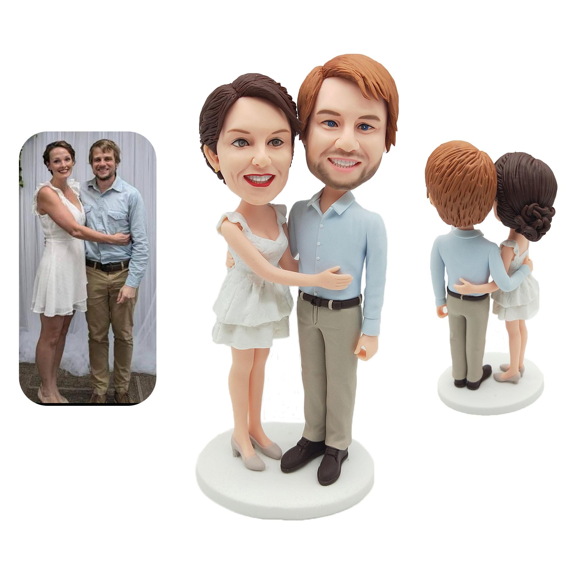 Personalized couple bobbleheads, custom couple wedding bobbleheads, wedding cake toppers, wedding bobbleheads