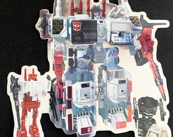 May include: A sticker featuring a silver and red robot with a black chest and a red gun. The robot is standing on a white background. There are three smaller robots in the image, one red, one black, and one tan.