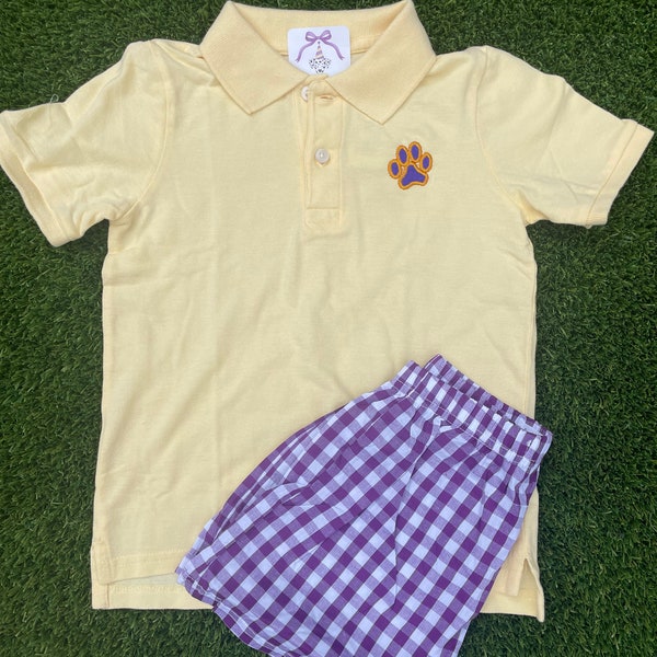 Light yellow (or dark gold) polo with tiger paw