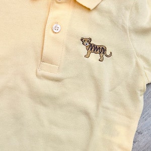Mike der Tiger hellgelbes Poloshirt