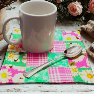 Quilted Mug Rug 7.5x7.5 – Handmade 16-Patch Coaster with Pink & Green Floral Daisies, Cotton Fabric, Pink Flannel Backing
