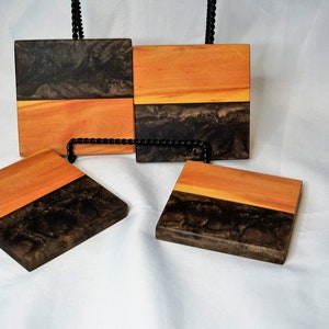 Set of Black and Bronze Epoxy Resin Wood Coasters