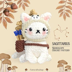 May include: White crocheted cat wearing a brown and white Sagittarius costume with blue arrows and a brown quiver. The cat is sitting on a light brown background with a brown and white mushroom in the corner. The text "SAGITTARIUS HOROSCOPE CROCHET PATTERN" is in the bottom right corner.