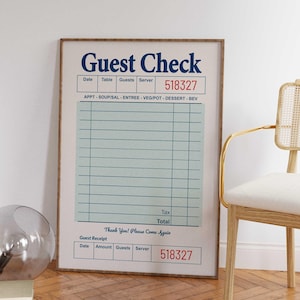 May include: A framed print of a vintage-style "Guest Check" receipt. The text is in navy blue and red, with a light blue grid for itemizing orders. The receipt includes the text "Thank You! Please Come Again."