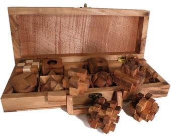 12 Wooden Puzzles Set In Wooden Suitcase