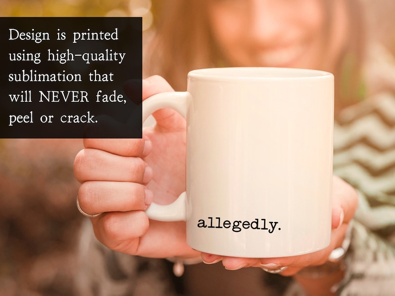 May include: White ceramic coffee mug with black text that reads "allegedly."