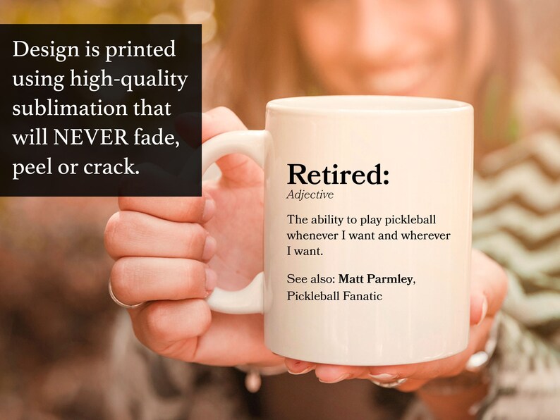 May include: White ceramic coffee mug with a black design that reads "Retired: Adjective The ability to play pickleball whenever I want and wherever I want. See also: Matt Parmley, Pickleball Fanatic"