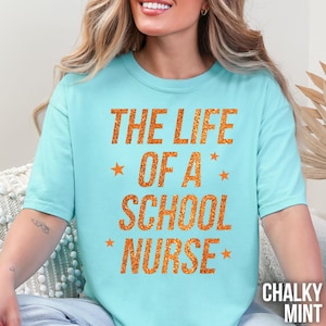 Comfort Colors School Nurse Shirt, The Life of a School Nurse Tshirt, New School Nurse Gifts for RN Nurse, Nurse Week Shirt, Back to School