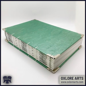 Elegante diario encuadernado a mano en verde escarchado, lujoso diario