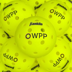 May include: A collection of bright neon yellow pickleballs, each featuring a series of circular holes and the black printed text Franklin and OWPP with a small circular logo. The balls are arranged in a cluster, showcasing their spherical shape.