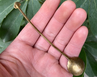 Antique and retro copper cast water spoon