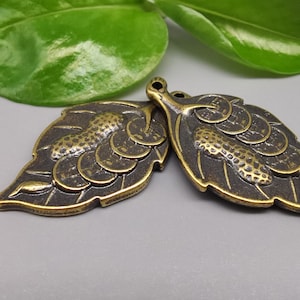 Two brass five emperor money pendants, distressed keychain accessories, feng shui fortune