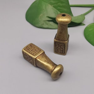 Two vintage brass cigarette holders, dry cigarette filter, antique men&#39;s old cigarette holder