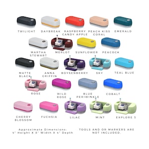 May include: A collection of colorful cutting machines in various shades, including Twilight, Daybreak, and Raspberry Candy Apple. Approximate dimensions are 4" height, 8" width, and 4" depth. Tools and markers are not included.