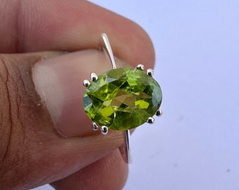 Genuine Peridot Ring: Oval Cut Sterling Silver, August Birthstone