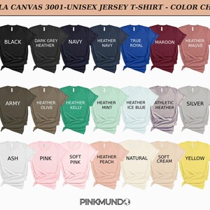 May include: Color chart of Bella Canvas 3001 unisex jersey t-shirts. The shirts are displayed in various colors, including black, navy, heather, true royal, maroon, and heather mauve. Additional colors include army, heather olive, heather kelly, and silver.